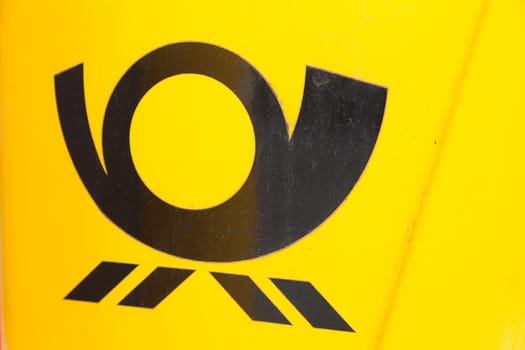 Postal logo on mailbox