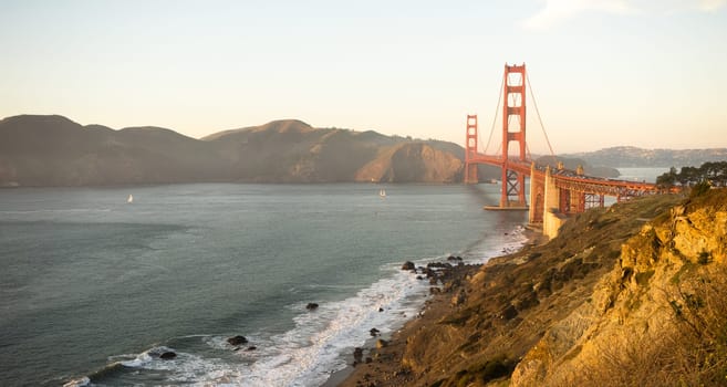 Travelers go on, under, and over the Golden Gate Bridge in San Francisco