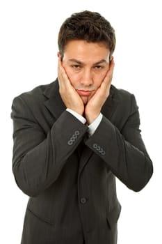 Businessman in a suit gestures with a headache