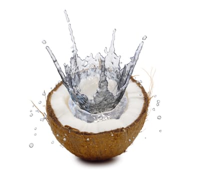 splash of juice inside the coconut on a white background