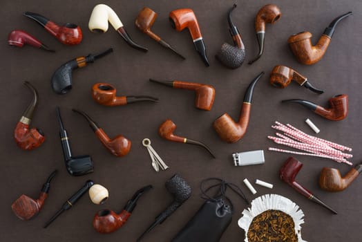 Collection of pipes and pipe smoking utensils
