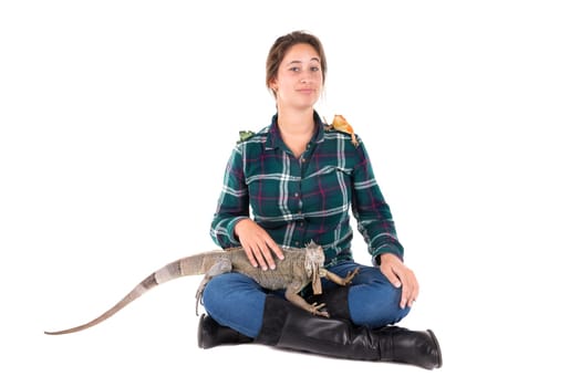 Girl with several pet animals isolated in white