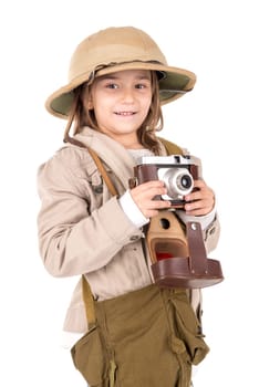 Young girl with a camera playing Safari isolated in white