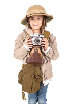 Young girl with a camera playing Safari isolated in white