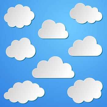 Various white paper clouds collection on blue background