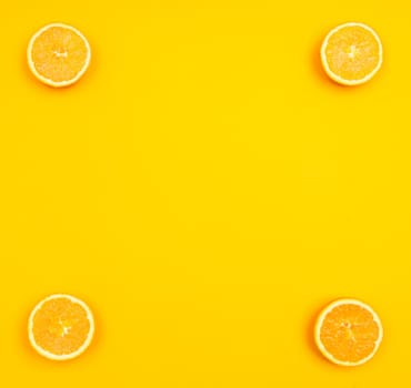 Orange pattern on orange colored background citrus arrangement