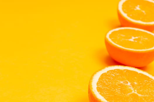 Orange pattern on orange colored background citrus arrangement