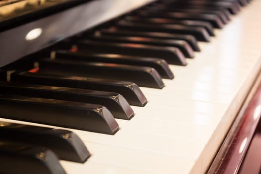 Piano keyboard with selective focus, stock photo