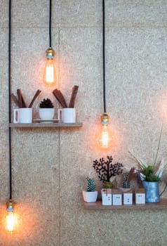 Vintage lighting decorated on brown background, stock photo