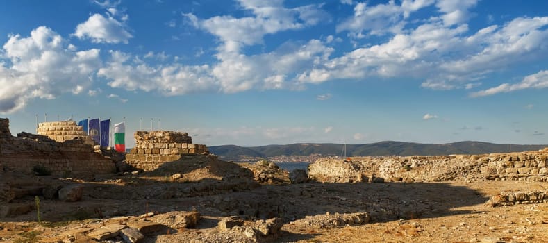 Nesebar, Bulgaria - September 06, 2013: Ruins and the remains of an ancient fortress wall in the old town of Nessebar, on the Black Sea coast. UNESCO world heritage site. Panoramic shot.