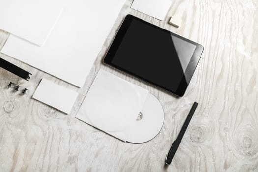 Blank stationery set on wooden table background. ID template. Mockup for branding identity for designers. Responsive design mock up.