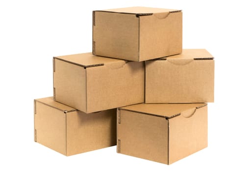 Five stacked small brown cardboard boxes insulated on white.