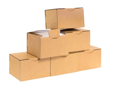 Six stacked small brown cardboard boxes insulated on white with individual opened internally illuminated cardboard.
