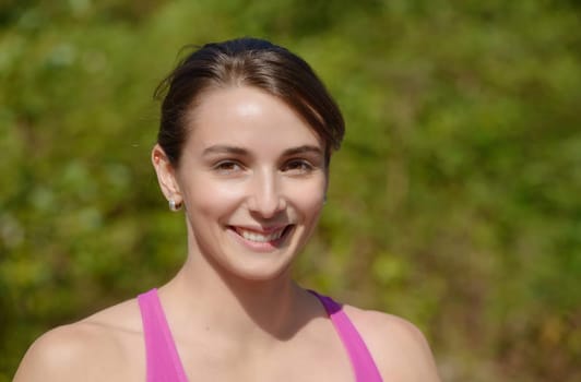 portrait of a young sporty woman in the countryside