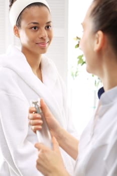 a woman's face during a treatment at a beauty salon\nultrasound infrared light,facial treatment\nultrasounds,a woman in a beauty salon\nlight therapy,a woman in a beauty salon\nacne treatment with light,a woman in a beauty salon