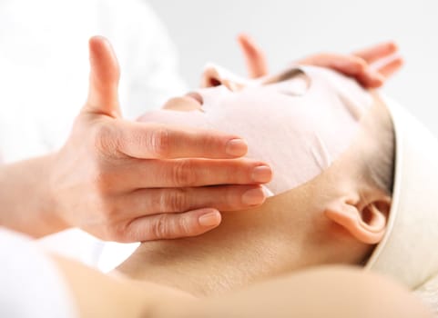 beauty parlor,natural cosmetics. natural spa,woman in collagen mask