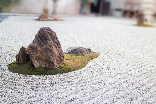 Zen gardens typically contain gravel and bare stones, stock photo