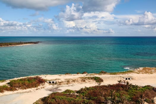 An island with sand overlooking the atlantic ocean
