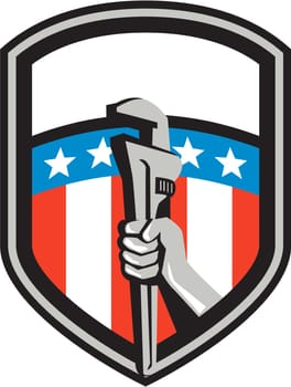 Illustration of a plumber hand holding adjustable pipe wrench viewed from the side set inside shield crest with usa american stars and stripes flag in the background done in retro style.