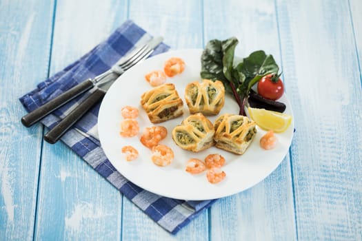 puff pastry filled with salmon & spinach,shrimp and cream cheese,fresh spinach