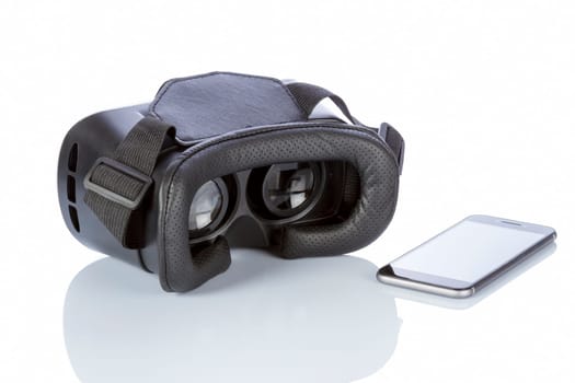 VR Glasses and smartphone with clipping path for screen isolated on white background.