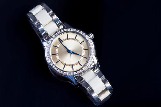 Lady watch on a black background.