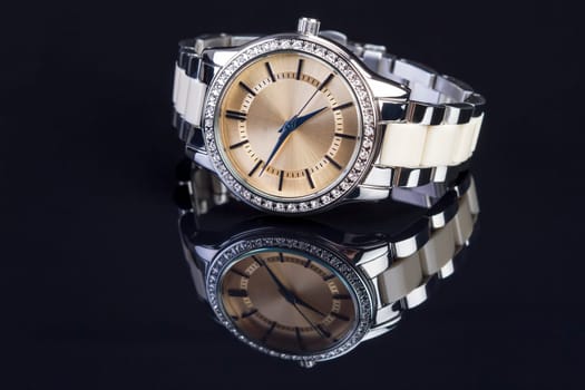 Lady watch on a black background.