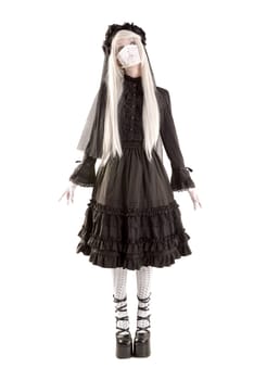 Widow in a black dress with white eyes looking like a doll isolated in white