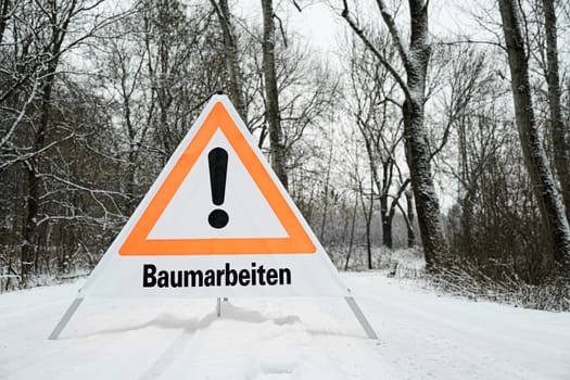 Sign with the inscription Tree work in the forest