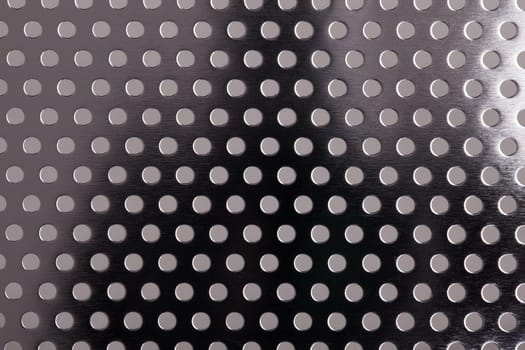Perforated metal stainless steel sheet viewed from above