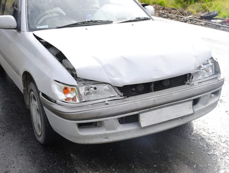 The modern car broken after road failure