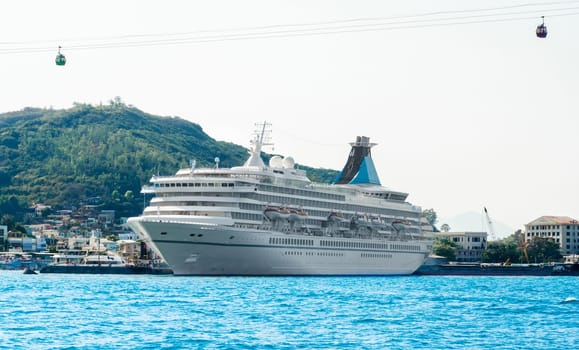 Big, white cruise ship in port
