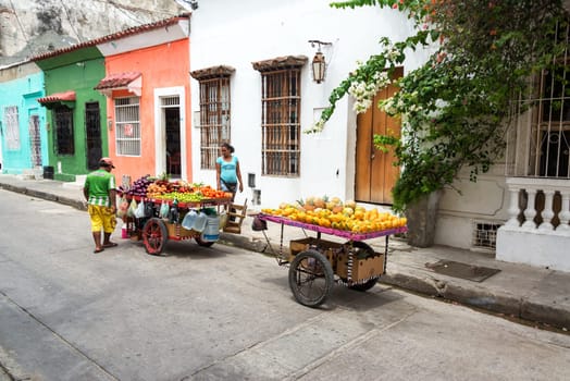 CARTAGENA, COLOMBIA - MAY 24: Carts of fruit vendors in the Getsemani neighborhood of Cartagena, Colombia on May 24, 2016