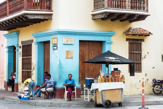 CARTAGENA, COLOMBIA - MAY 24: Juice vendor on a street corner in Cartagena, Colombia on May 24, 2016