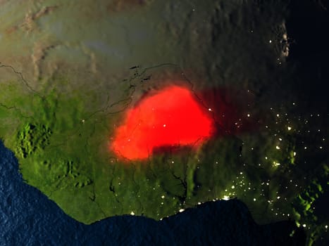 Burkina Faso in red at night as seen from Earth's orbit in space. 3D illustration with highly detailed realistic planet surface. Elements of this image furnished by NASA.