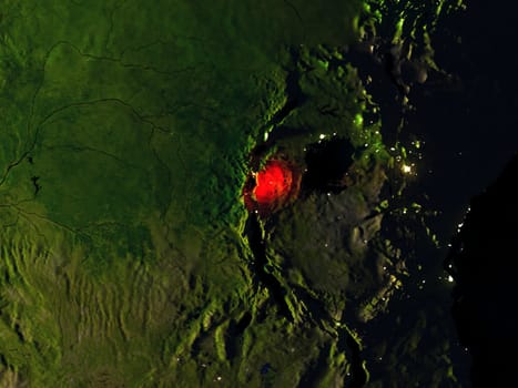 Rwanda in red at night as seen from Earth's orbit in space. 3D illustration with highly detailed realistic planet surface. Elements of this image furnished by NASA.
