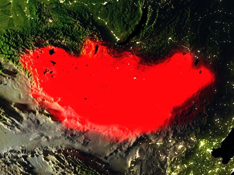 Mongolia in red at night as seen from Earth's orbit in space. 3D illustration with highly detailed realistic planet surface. Elements of this image furnished by NASA.