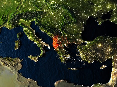 Albania in red at night as seen from Earth's orbit in space. 3D illustration with highly detailed realistic planet surface. Elements of this image furnished by NASA.