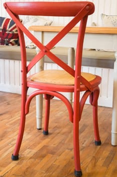 Single vintage red kitchen chair, stock photo