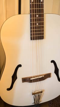 Accoustic guitar in the room, stock photo