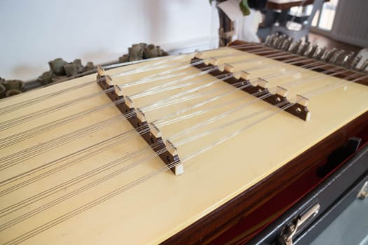 Wooden Thai dulcimer traditional musical instrument, stock photo