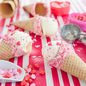 Vanilla ice cream in waffle tug with sugar sprinkles