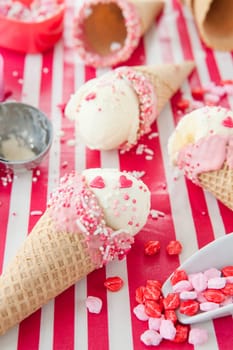 Vanilla ice cream in waffle tug with sugar sprinkles