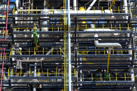 The photo of the pipeline of the plant processing fuel in summertime