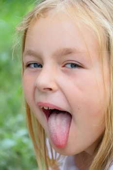 Portrait of girl with smile and makes faces