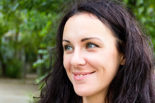 Portrait of European beautiful woman with black hair