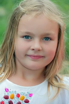 Portrait of beautiful girl with blue eyes