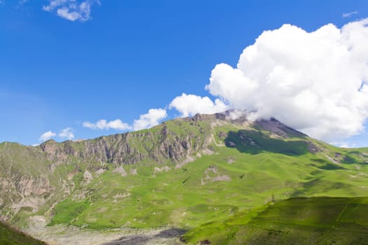 Summer landscape with Russian Caucasus green mountains