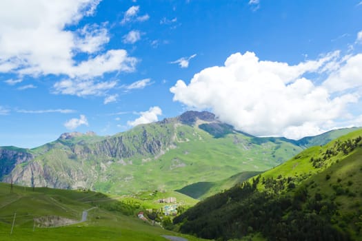 Summer landscape with Russian Caucasus green mountains