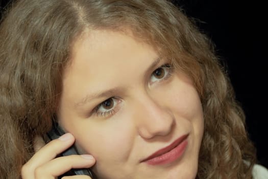 Portrait of young woman with long brown nature hair